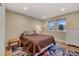 Bedroom featuring a plush bed, hardwood flooring, and mountain views at 613 Iowa St, Golden, CO 80403