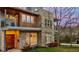 Beautiful modern home featuring a brick facade, wood accents, and a charming balcony at 613 Iowa St, Golden, CO 80403
