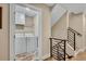 Hallway with laundry room featuring modern washer and dryer at 613 Iowa St, Golden, CO 80403