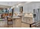 A modern kitchen with a large island, stainless steel appliances, and ample cabinet space at 613 Iowa St, Golden, CO 80403
