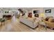 Living room featuring a modern fireplace, stylish decor, and an open floor plan at 613 Iowa St, Golden, CO 80403
