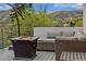 Rooftop deck featuring outdoor seating and mountain views at 613 Iowa St, Golden, CO 80403