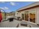 Rooftop deck with modern outdoor furniture, mountain view, and sliding glass doors at 613 Iowa St, Golden, CO 80403