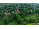 The home is nestled near a vibrant green area, complete with a winding stream, offering a beautiful natural escape at 8474 E Otero Cir, Centennial, CO 80112