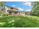Large backyard with pergola-covered patio, perfect for outdoor relaxation and entertaining at 8474 E Otero Cir, Centennial, CO 80112