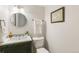 Modern bathroom featuring a stylish mirror, vanity, and contemporary fixtures at 8474 E Otero Cir, Centennial, CO 80112
