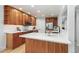 Spacious kitchen featuring white countertops and stainless steel appliances at 8474 E Otero Cir, Centennial, CO 80112