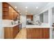 Bright kitchen with stainless steel appliances and ample cabinet space at 8474 E Otero Cir, Centennial, CO 80112