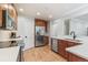 Updated kitchen with wood cabinets and stainless steel appliances at 8474 E Otero Cir, Centennial, CO 80112