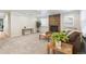 Inviting living room featuring a brick fireplace and neutral decor at 8474 E Otero Cir, Centennial, CO 80112