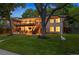 Outdoor entertaining is made easy in this backyard with deck and tree swing at 13693 W Utah Cir, Lakewood, CO 80228