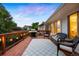 Enjoy outdoor living on this lovely deck with outdoor seating and gas grill at 13693 W Utah Cir, Lakewood, CO 80228