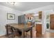 Eat-in kitchen with stainless steel appliances and beautiful wood cabinets at 13693 W Utah Cir, Lakewood, CO 80228