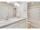 Bathroom with double vanity and a tub shower combo at 2245 Base St, Fort Lupton, CO 80621