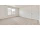 Spacious bedroom featuring a window and neutral wall colors at 2245 Base St, Fort Lupton, CO 80621