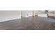 Spacious living room with hardwood floors and lots of natural light at 2245 Base St, Fort Lupton, CO 80621