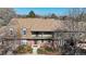 Charming two-story townhome with well-maintained landscaping and inviting entryway at 8752 E Amherst Dr # D, Denver, CO 80231