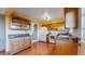 Traditional kitchen features wooden cabinets, granite countertops, and a convenient layout at 8752 E Amherst Dr # D, Denver, CO 80231