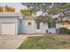 Charming single-story home with attached garage and well-maintained front lawn at 16179 E Rice Pl # B, Aurora, CO 80015