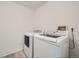 Laundry area featuring modern washer and dryer at 16179 E Rice Pl # B, Aurora, CO 80015