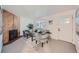 Cozy living room with modern furniture, wood-burning fireplace, and plenty of light at 16179 E Rice Pl # B, Aurora, CO 80015