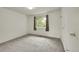 Spacious bedroom with large window and neutral carpeting for a comfortable feel at 5275 Cody St, Arvada, CO 80002