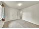 Neutral-toned bedroom with plush carpeting and ample natural light at 5275 Cody St, Arvada, CO 80002
