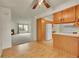 Open-concept living area featuring a fireplace and new carpeting at 5275 Cody St, Arvada, CO 80002