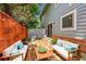 Backyard patio with comfortable outdoor furniture and string lights, perfect for relaxing at 5275 Cody St, Arvada, CO 80002