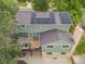 Aerial view of home featuring solar panels and a spacious deck at 11039 W 65Th Way, Arvada, CO 80004