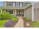 Inviting front door with wreaths and beautiful landscaping leading up to the entrance at 7708 S Krameria Ct, Centennial, CO 80112