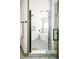 Modern bathroom showcasing a walk-in shower, a soaking tub, and stylish tile work at 11710 Spruce Canyon Cir, Golden, CO 80403