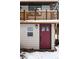 Close up of home with snow, stylish front door and wood railings at 11710 Spruce Canyon Cir, Golden, CO 80403