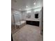 Spacious bathroom featuring a soaking tub, separate shower, and double vanity with dark wood cabinetry at 1815 Avery Way, Castle Rock, CO 80109