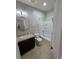 Clean bathroom featuring a single sink vanity and shower-tub combo offers relaxation and convenience at 1815 Avery Way, Castle Rock, CO 80109