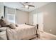 Cozy bedroom with a comfortable bed and neutral color palette creates a soothing and peaceful atmosphere at 1815 Avery Way, Castle Rock, CO 80109