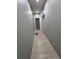Hallway with wood flooring leads to multiple rooms, including a storage area for organized living at 1815 Avery Way, Castle Rock, CO 80109