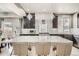 Kitchen with large island, stainless appliances, modern cabinets, and pendant lighting at 1815 Avery Way, Castle Rock, CO 80109