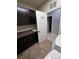 Convenient laundry room with sink, cabinets, and laundry appliances offers functionality at 1815 Avery Way, Castle Rock, CO 80109