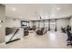 Bright and open living room with recessed lighting, ceiling fan, and lots of natural light at 1815 Avery Way, Castle Rock, CO 80109