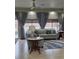 Bright living room featuring ample natural light and comfortable seating is great for relaxing or entertaining at 1815 Avery Way, Castle Rock, CO 80109