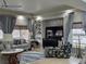 Inviting living room with large windows and stylish furnishings creates a cozy and relaxing atmosphere at 1815 Avery Way, Castle Rock, CO 80109