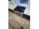 Stainless steel oven and dark kitchen cabinets with tile backsplash and granite countertops at 1815 Avery Way, Castle Rock, CO 80109