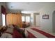 Spacious bedroom with a seating area and natural light at 2819 Canyon Crest Dr, Highlands Ranch, CO 80126