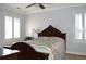 Bright bedroom with large windows and stylish shutters at 2819 Canyon Crest Dr, Highlands Ranch, CO 80126