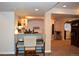 Cozy dining area with bar seating and an open floor plan, perfect for gatherings at 2819 Canyon Crest Dr, Highlands Ranch, CO 80126