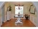 Charming dining room with hardwood floors and wainscoting details at 2819 Canyon Crest Dr, Highlands Ranch, CO 80126