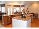 Gourmet kitchen with granite counters, a breakfast bar and stainless steel appliances at 2819 Canyon Crest Dr, Highlands Ranch, CO 80126