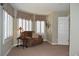 Comfortable living room with plush seating and natural light at 2819 Canyon Crest Dr, Highlands Ranch, CO 80126