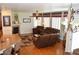 Inviting living room with plush seating, a fireplace and natural light at 2819 Canyon Crest Dr, Highlands Ranch, CO 80126